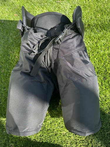 Slightly Used Large CCM HPTKXP Hockey Pants