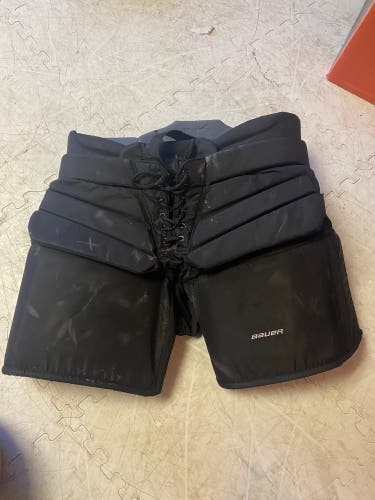 Used large Bauer pro department ncaa spec pants