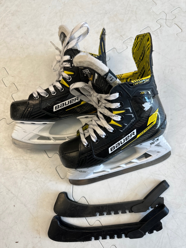 Junior Bauer Regular Width Size 1.5 Supreme M4 Hockey Skates