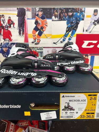 Adjustable Microblade rollerblades size 2-5 Pink And White