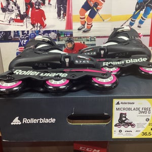 Adjustable 3 wheeled  Microblade rollerblades size 5-8  Pink and grey