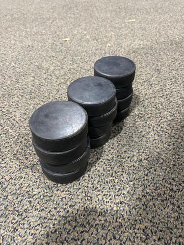 Used Pack of 12 Hockey Pucks