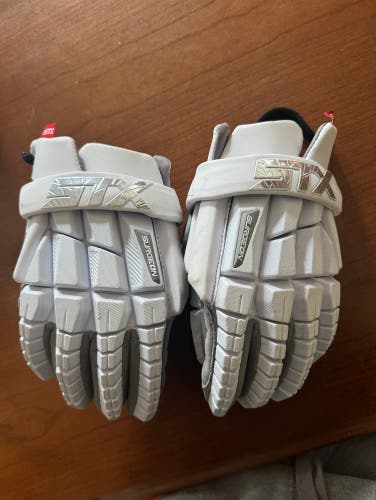 Used Stx surgeon medium goalie gloves