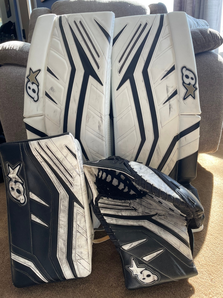 Brian’s hockey goalie pads, glove and blocker