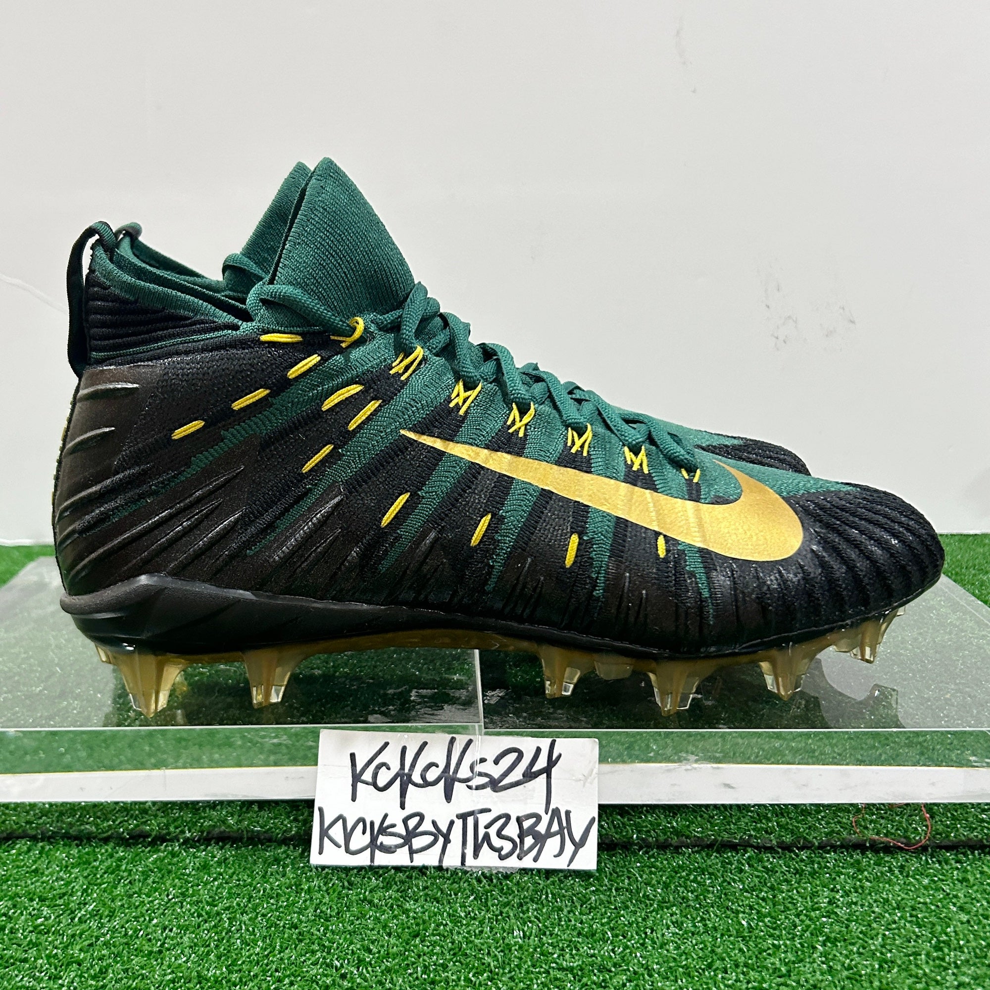nike football cleats green and black