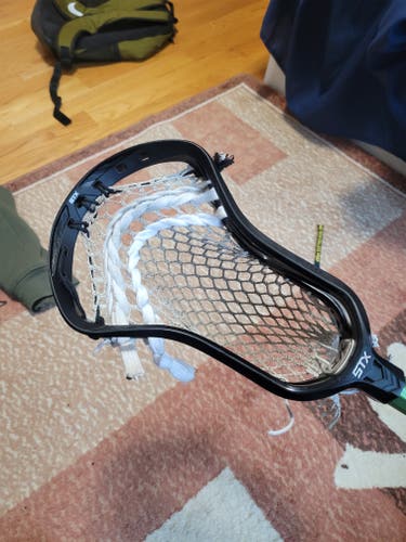 Used Attack & Midfield STX Strung Surgeon 1K Head
