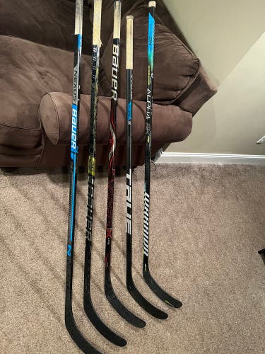 Used Bauer Right Handed Hockey Sticks + Brand new Sher Wood Rekker Gloves
