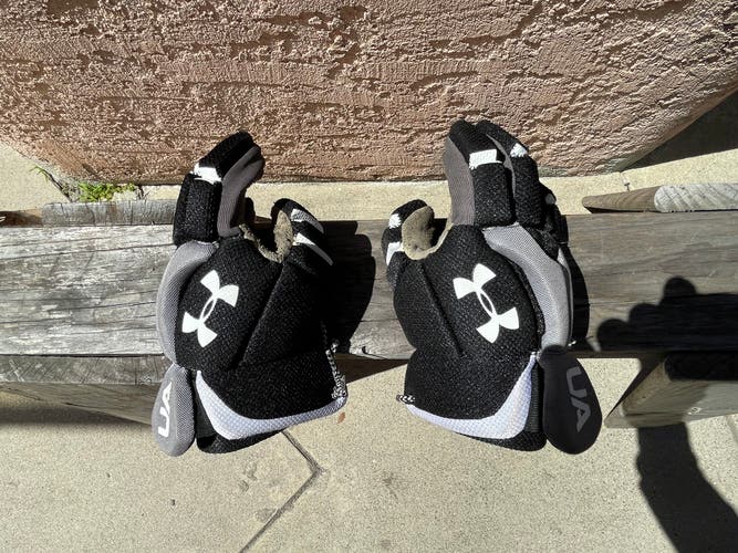 Used  Under Armour Small Lacrosse Gloves