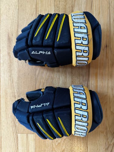 Used  Warrior 11" Alpha QX3 Gloves