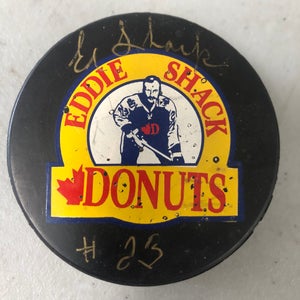 Eddie Shack puck (autographed)