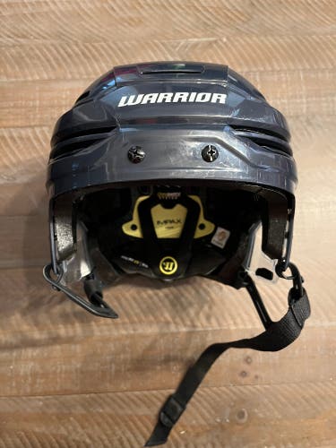 Warrior Alpha One Pro Hockey Helmet Sr. Med, slightly used.  Navy Blue