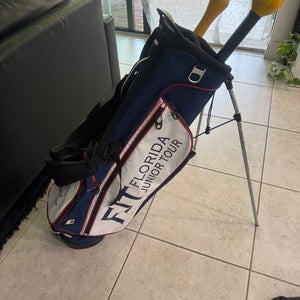 Ping golf stand bag with double shoulder strap and club dividers  Florida junior tour
