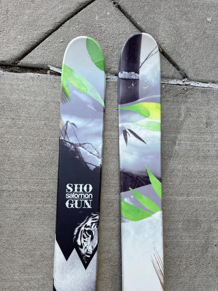 Used Men's Salomon Shogun 182 cm Powder Skis With Z10 Bindings