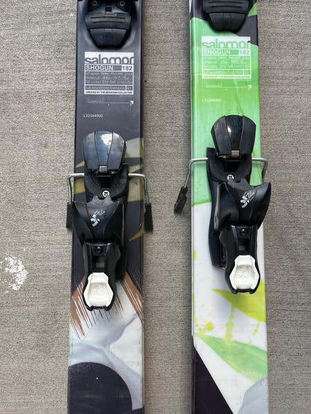 Used Men's Salomon Shogun 182 cm Powder Skis With Z10 Bindings