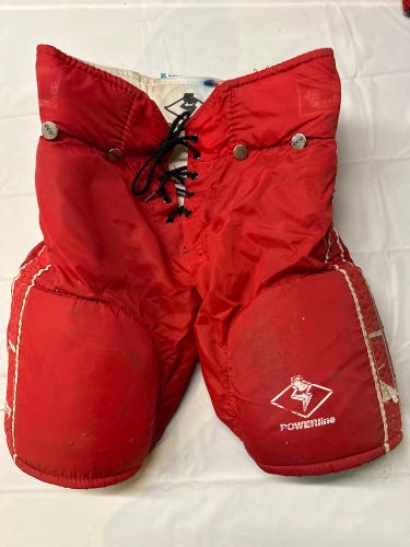 Used CCM Powerline Youth Large Hockey Pants Red.