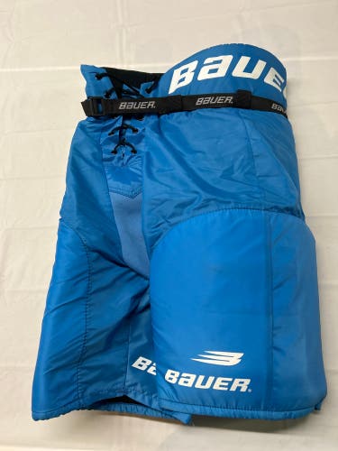 Used Bauer Impact 500 Sr. Small Hockey Pants Light Blue.