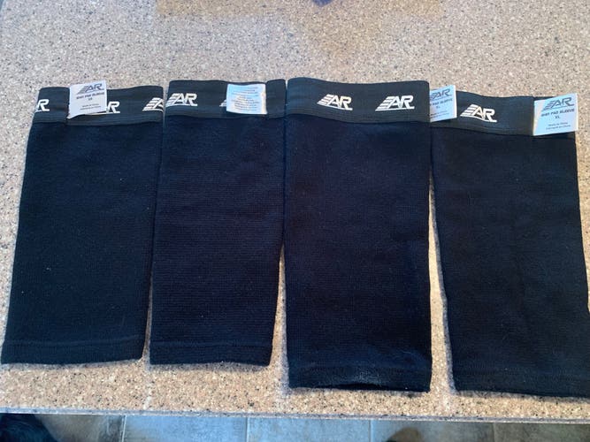 Two pairs of lightly used A&R  shin pad sleeves, sizes SR and XL