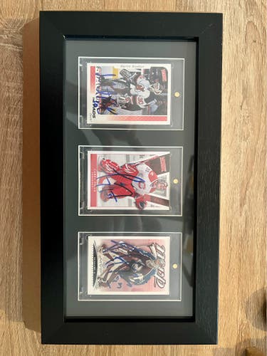Autographed Hockey Card Frame by legendary players Carey Price, Patrick Roy, and Martin Brodeur.