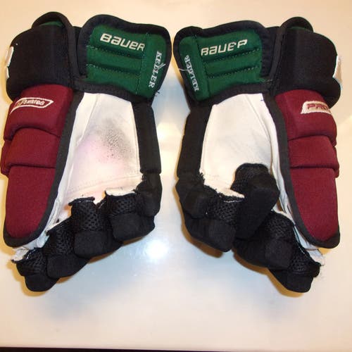 ARIZONA COYOTES Clayton Keller game-worn 13-inch Bauer Pro Series kachina-style gloves