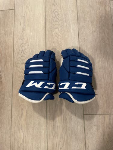 Used CCM 14" Tacks 4 roll pro 2 Gloves