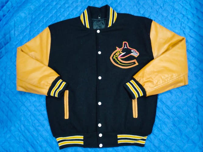 NHL VANCOUVER CANUCKS VARSITY JACKET  NEW WITH TAGS AND LEATHER SLEEVES
