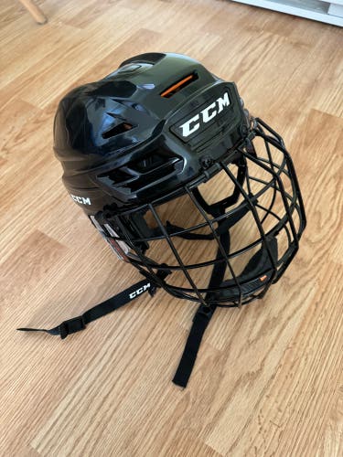 Used Large CCM Tacks 710 Helmet Combo