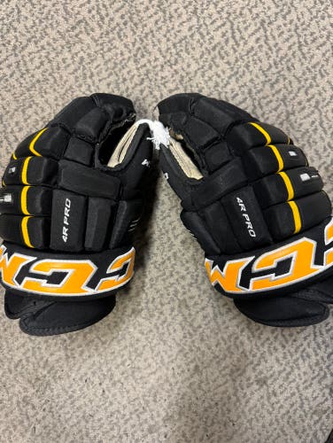 Used CCM 4R Pro 14” Black/Gold hockey gloves