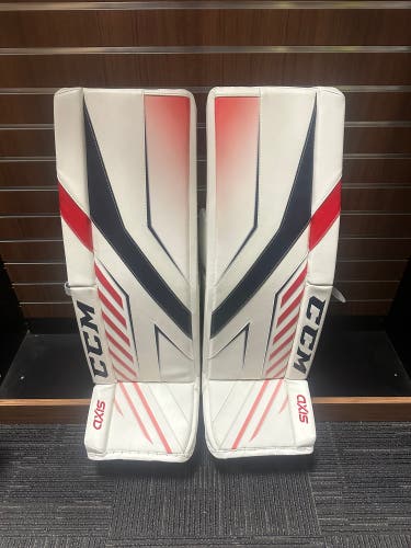 CCM Axis Pro Goalie Leg Pads 33”+2 (Whi/Red/Blue)