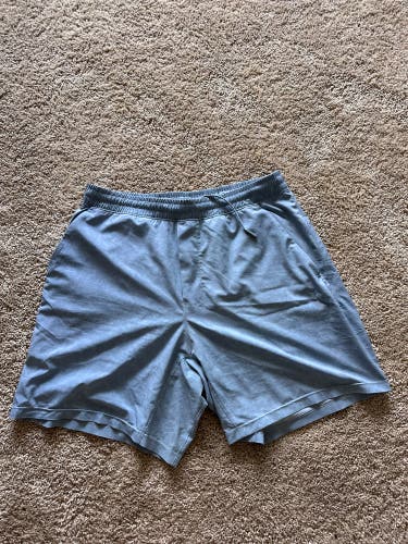 Blue Lululemon pace breaker shorts 7” inseam