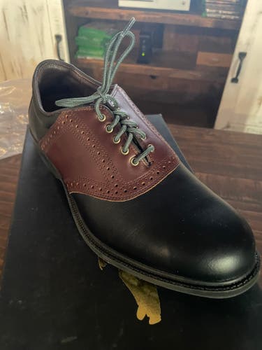 New and never worn pair of Allen Edmonds Golf Shoes, Brown and Black Leather, Size 10 D