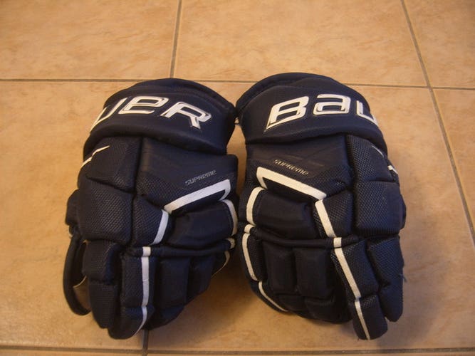 Good Condition Bauer Supreme Ultrasonic Hockey Gloves sz 12" Blue/White