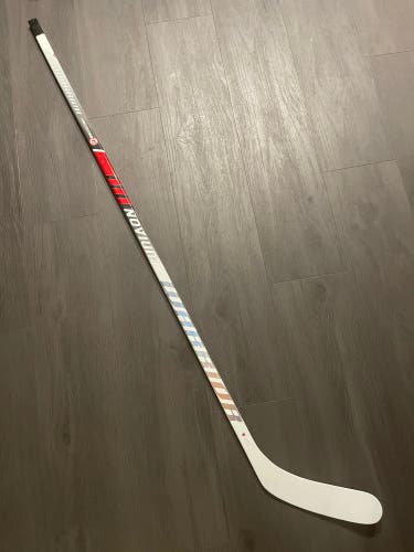 Warrior LX2 Pro Dressed As White Novium Hockey Stick