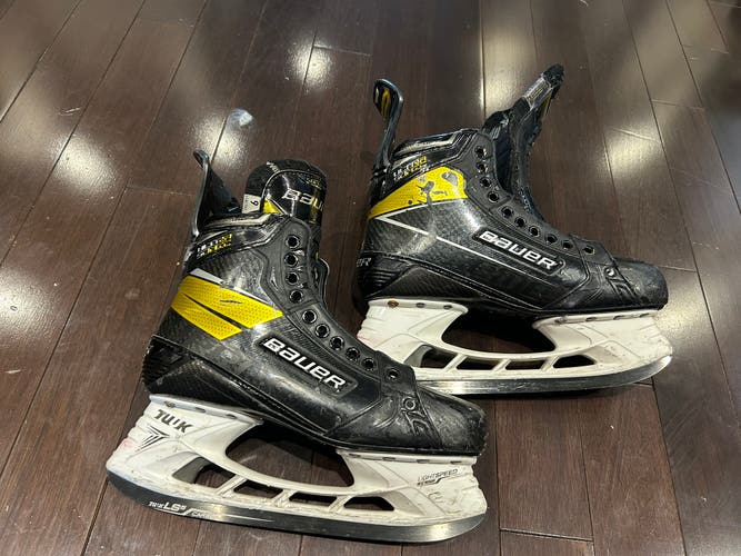 Used Senior Bauer 9.5 Supreme UltraSonic Hockey Skates