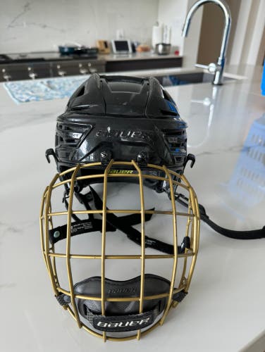 Bauer ReAkt 150 Helmet with cage