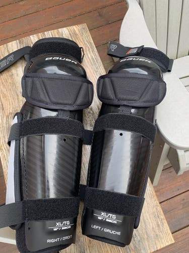 Like new , only used twice,  Bauer Referee  Shin Pads 15"