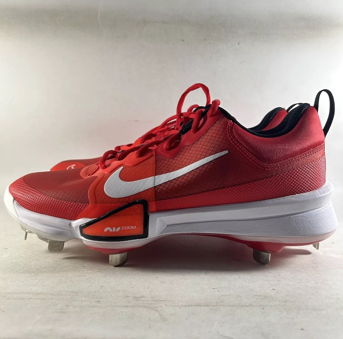 red nike baseball cleats