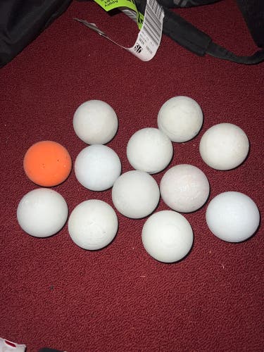 9 Pearls and 3 Non Greasy Lacrosse Balls (Used)