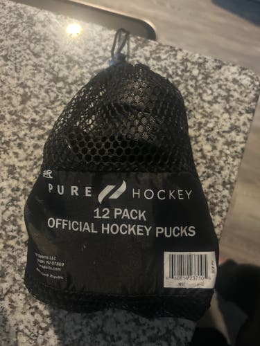 11 New Hockey Pucks