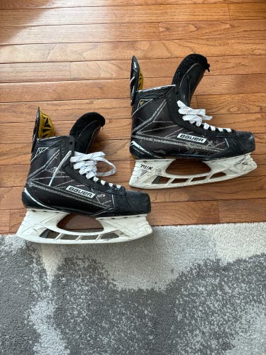 Used Senior Bauer Regular Width  Pro Stock 9.5 Supreme 1S Pro Hockey Skates