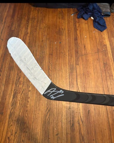 Alex Tuch game used autographed hockey stick