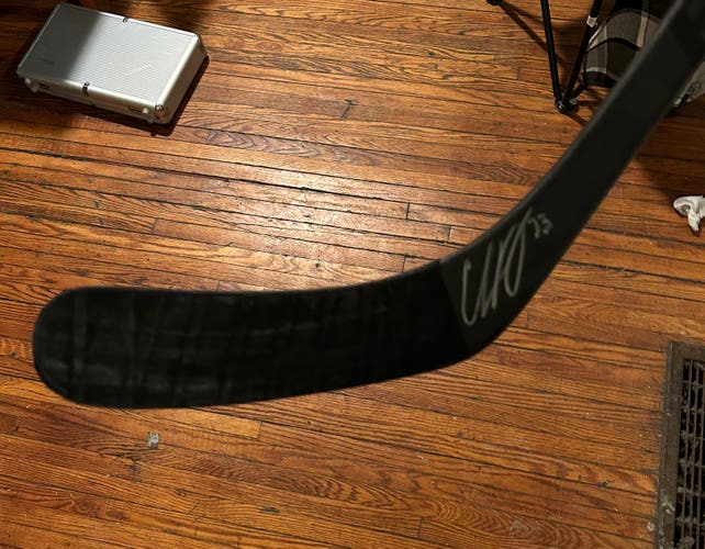 Charlie Mcavoy game used autographed stick