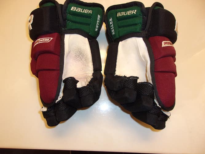ARIZONA COYOTES Clayton Keller game-worn 13-inch Bauer Pro Series kachina-style gloves
