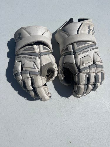 Used  Under Armour Medium Engage Lacrosse Gloves
