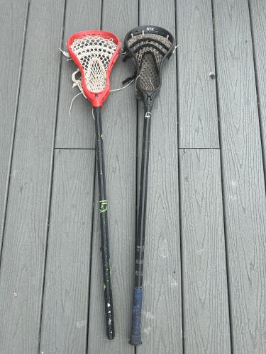 Two Used Lacrosse Sticks