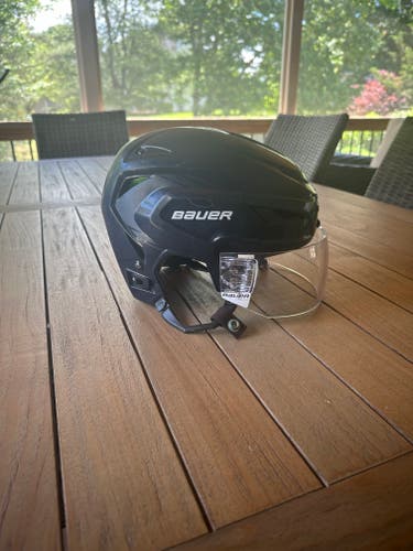 Used Navy Medium/Large Bauer Hyperlite Helmet