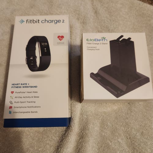 Fitbit Charge 2. Heart Rate + Fitness Wristband with a Fitbit Charge 2 Stand
