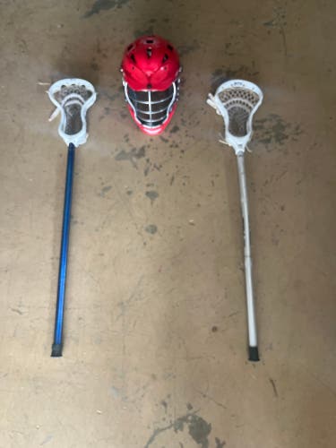 Lacrosse Sticks And Helmet
