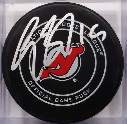 TRAVIS ZAJAC Autographed New Jersey Devils Official NHL Hockey GAME PUCK Signed