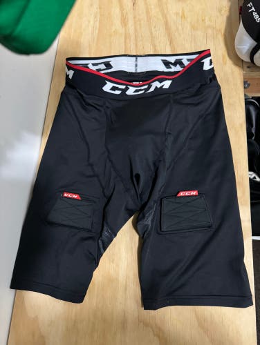 Used ccm compression jock shorts and cup size large