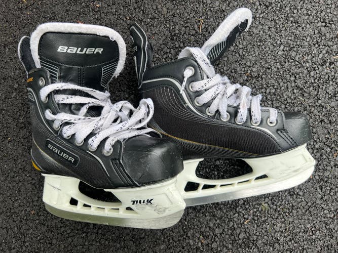 Used Junior Bauer Regular Width  Size 1 Supreme Hockey Skates